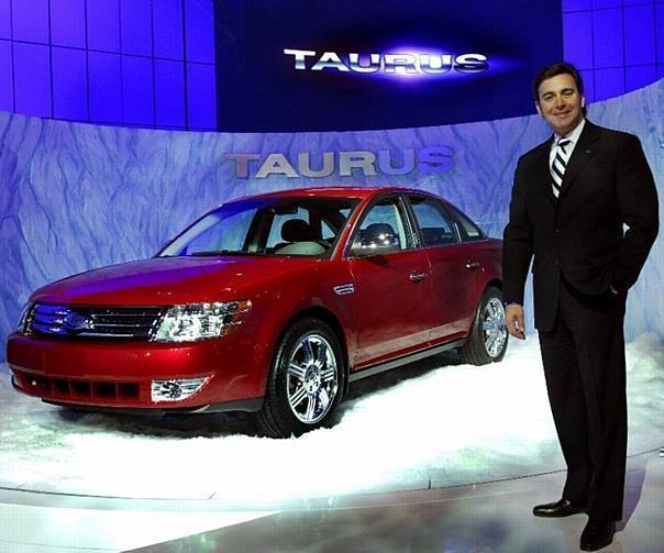 Mark Fields with new 2008 Ford Taurus in Chicago.